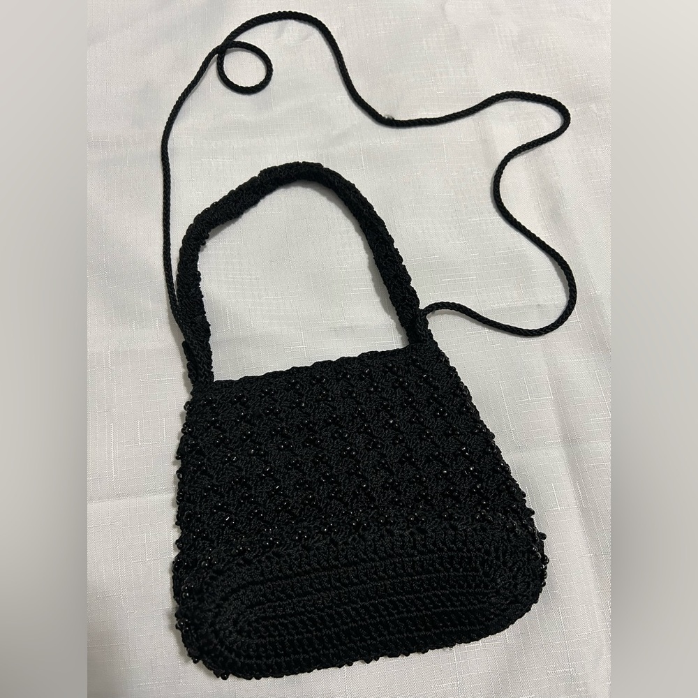 Black small beaded special occasion purse. Magnet close.Excellent used condition